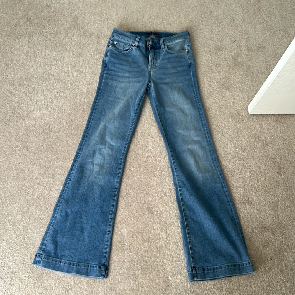 Womens flared jeans with design on back pocket